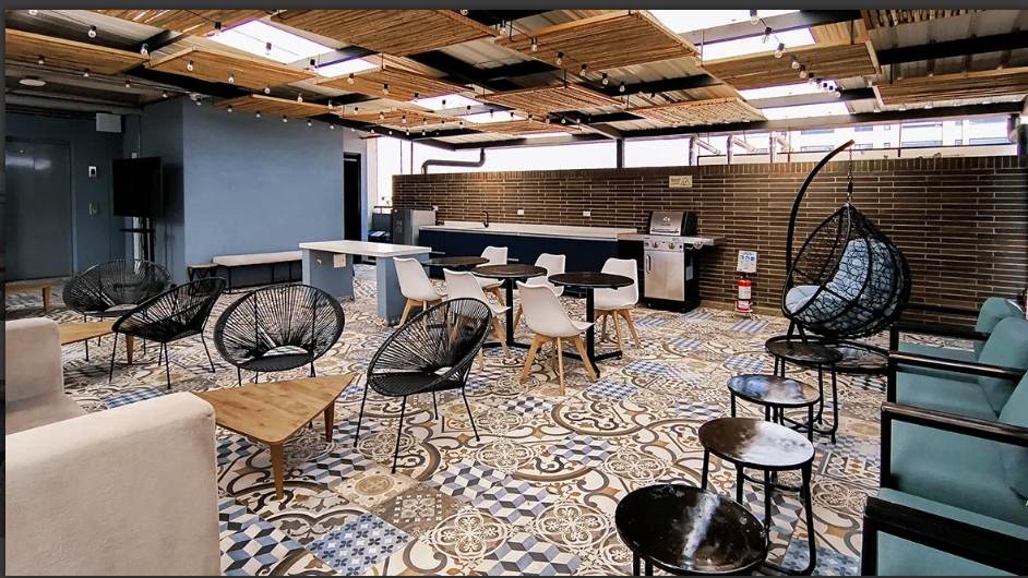 Terraza · zonas lounge y BBQ